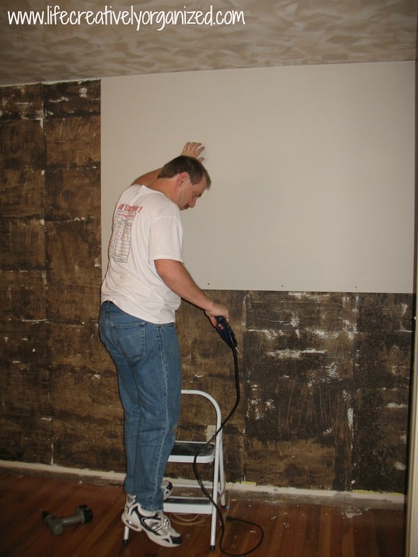 adding-first-drywall-over-cork – Copy