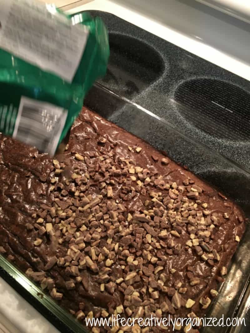 Top hot brownies with Andes baking chips