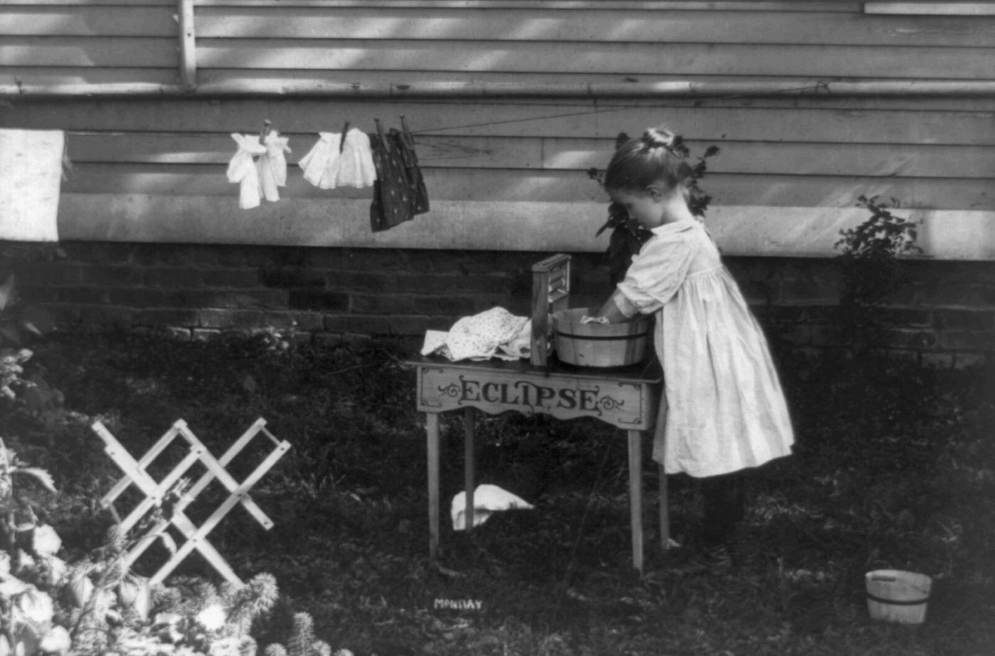 Little_girl_playing–doing_laundry