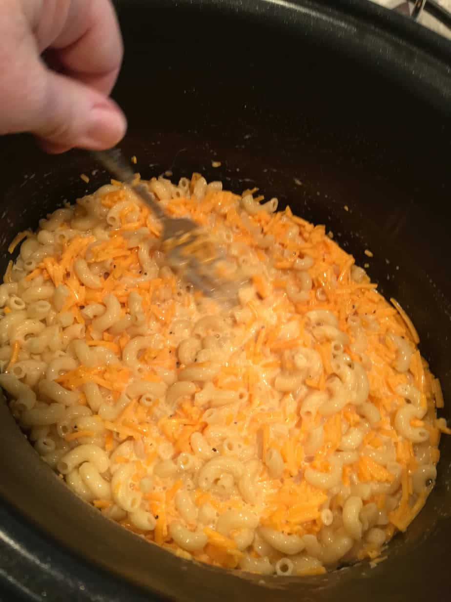mixing mac n cheese ingredients