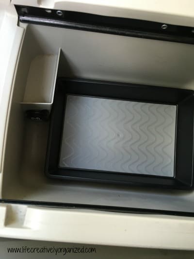 Organize a car console for $5 – add a non-slip tray
