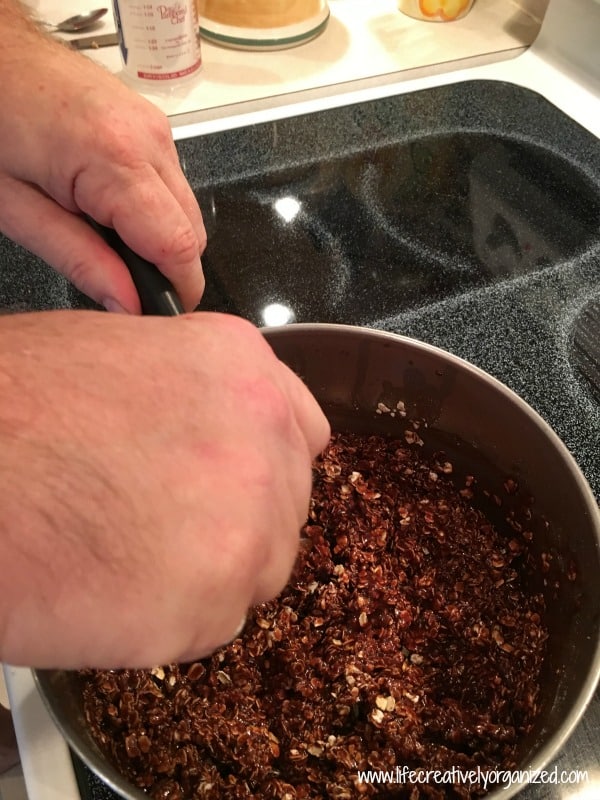 Mixing no-bake cookies.