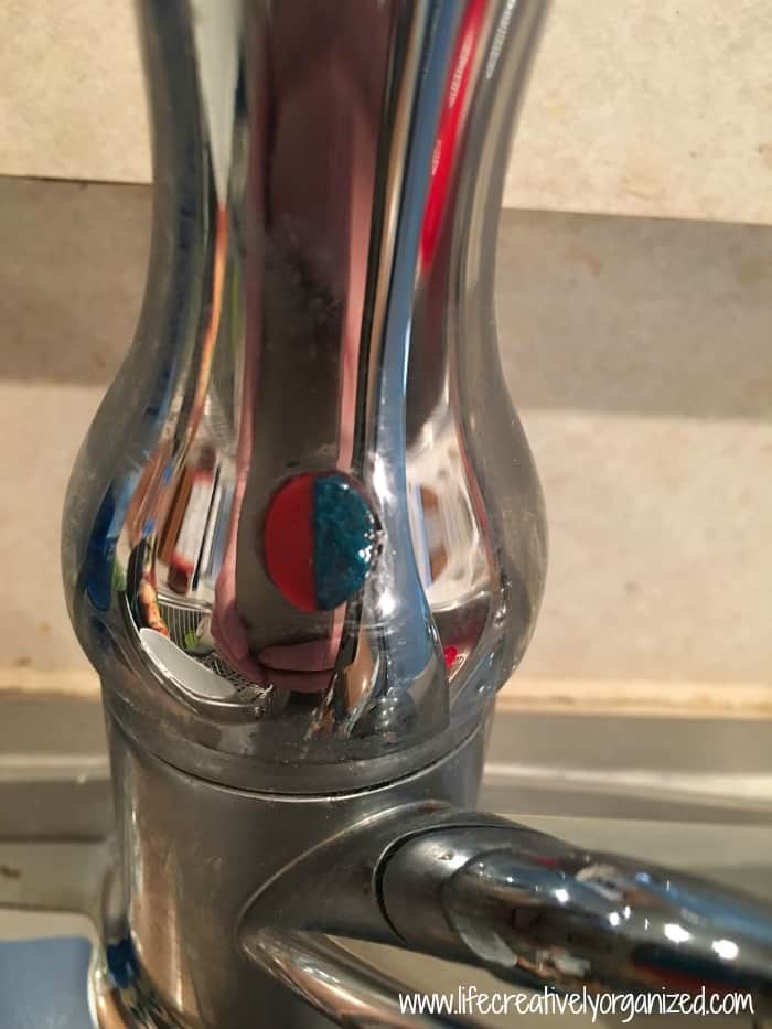 Simple DIY hot/cold faucet fix. The blue paint rubbed off the hot/cold
